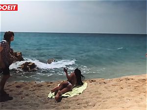 LETSDOEIT - warm ebony teen nailed rock-hard At The Beach